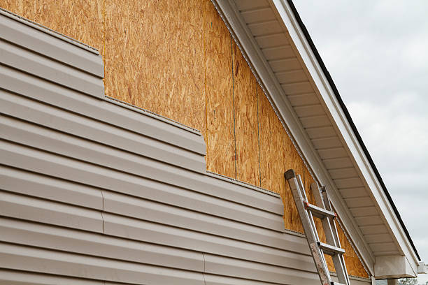 Professional Siding technician working in Milford, OH